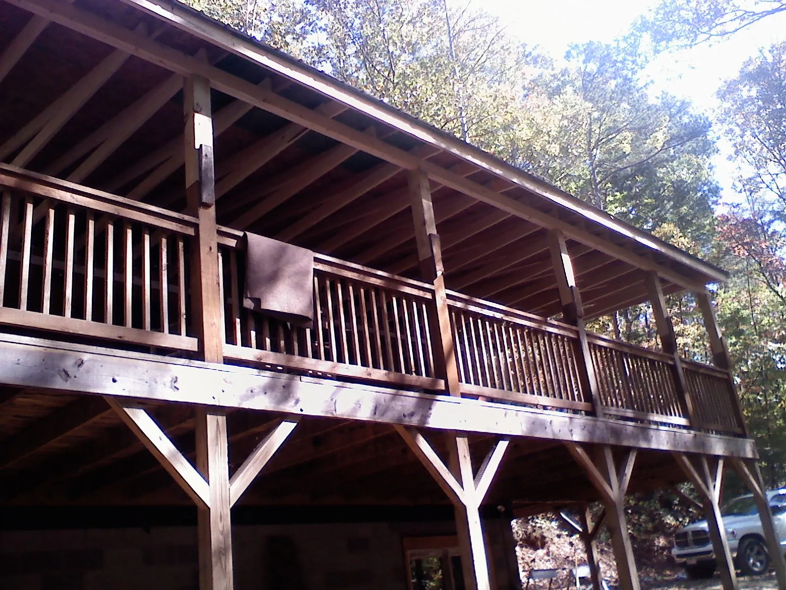 Timber framing under a new elevated porch and deck — Roof Leak Repair in Red Hook by Roofing Brothers
